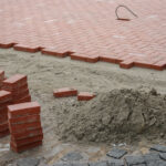 Sidewall or pavement construction with the red bricks